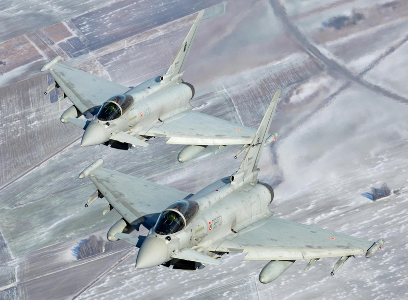 Illustration for article titled These Shots Of Fulcrums and Eurofighters Over Lithuania Are Amazing